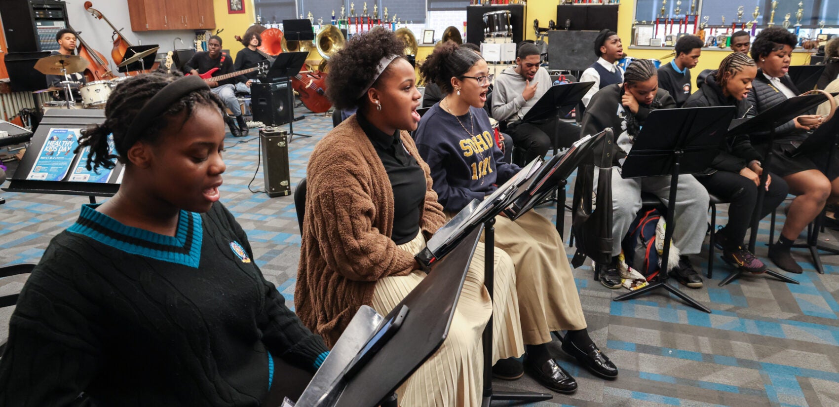 Many students rehearsing music at Creative Arts High School