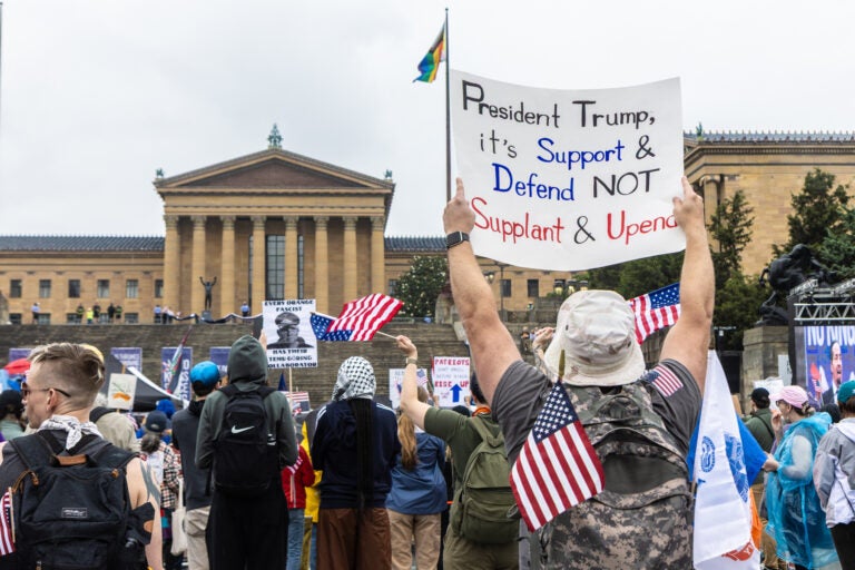 Protesters waved American flags at the Philadelphia Museum of Art during the No Kings protest on June 16, 2024. (Kimberly Paynter/WHYY)