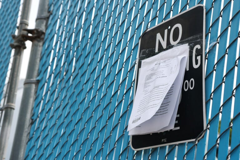 A posted court order stating that sanitation workers could not stop Philadelphia residents from dropping off trash at the Northwest Sanitation Convenience Center