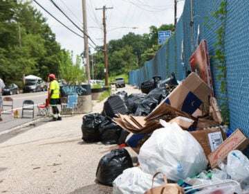 bags of trash outside the Northwest Sanitation Convenience Center