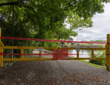 A sign shows that part of Bartram' Garden Hiking trail is closed
