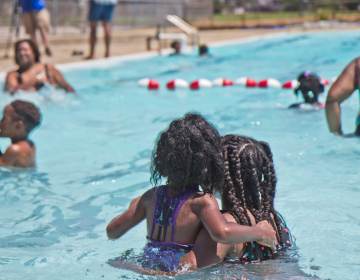 Kids swim at the James Finnegan Playground pool