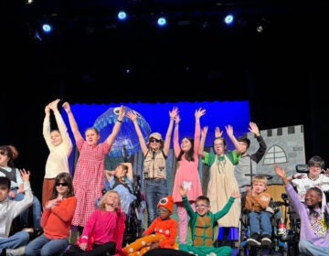 Students with Acting Without Boundaries on stage