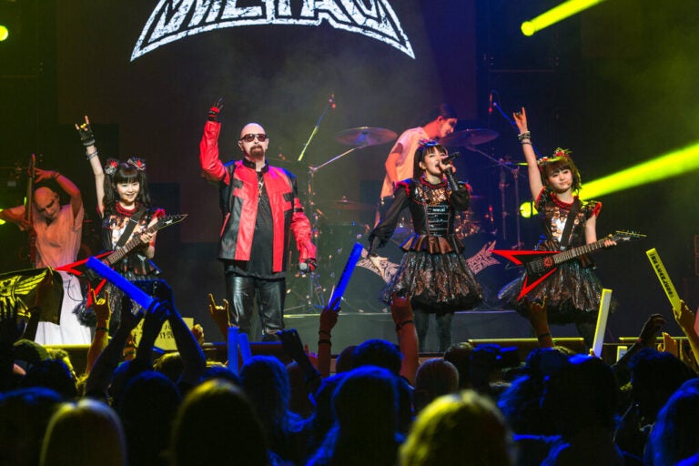 Members of the band BABYMETAL perform on stage