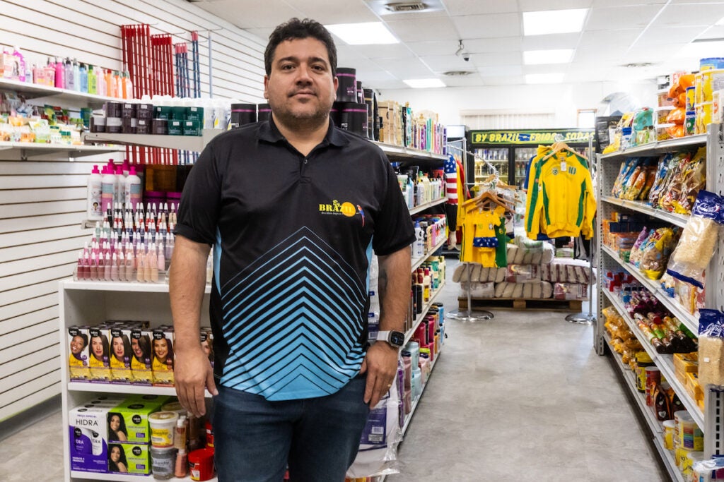 Adalton De Rosa De Abreu standing in store