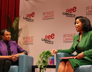 Carla Hayden, 14th Librarian of Congress, spoke with Ashley Jordan, president and CEO of the African American Museum in Philadelphia, at an event at the Free Library of Philadelphia Central Branch on June 28, 2025. (Emily Neil/WHYY)