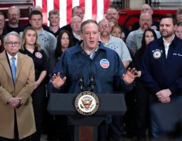 Environmental Protection Agency administrator Lee Zeldin, center, speaks