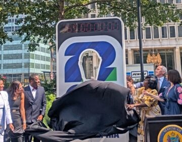 Officials unveil the new countdown clock