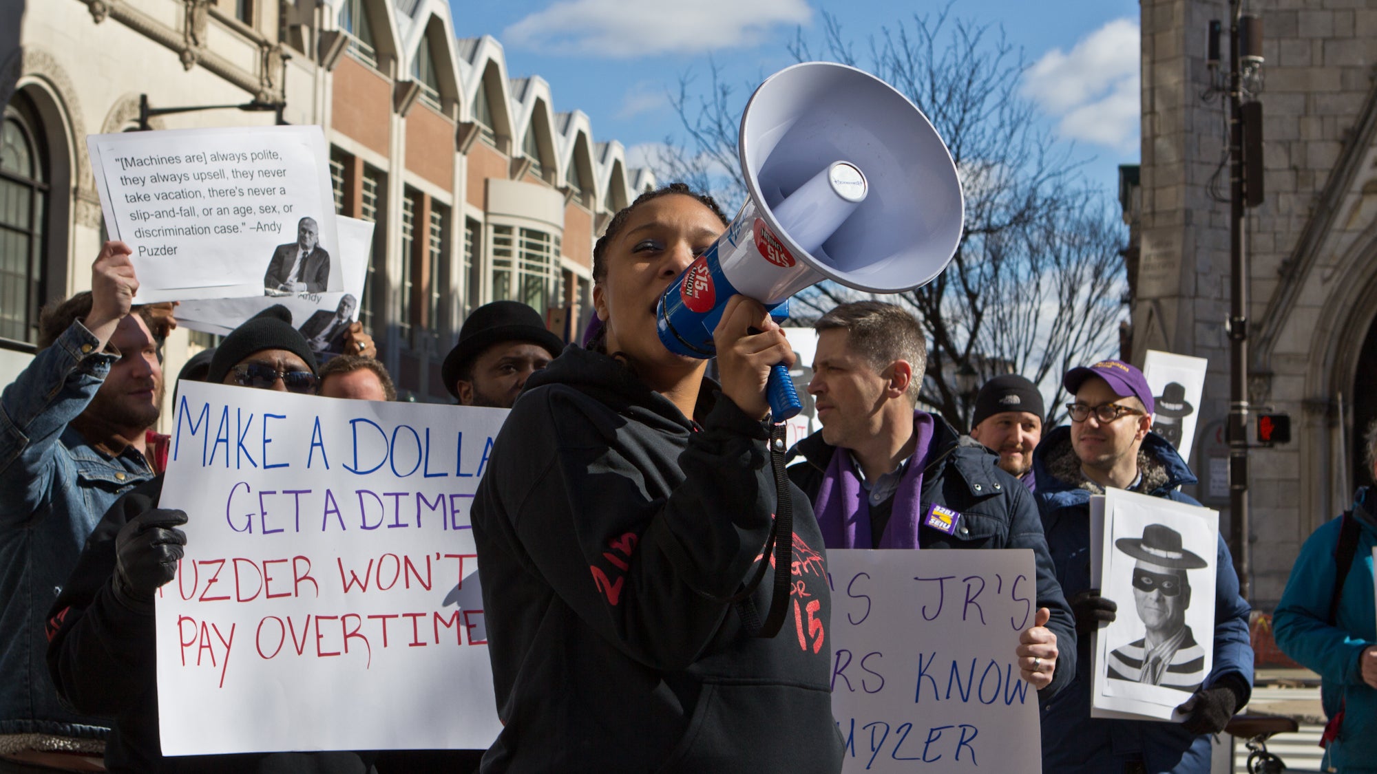 Alicia Hamiel, mother of a one year-old, has worked at McDonald’s for five years and makes $7.25 an hour. She protests President Trump’s nomination of Andy Puzder for head of Secretary of Labor. (Kimberly Paynter/WHYY)