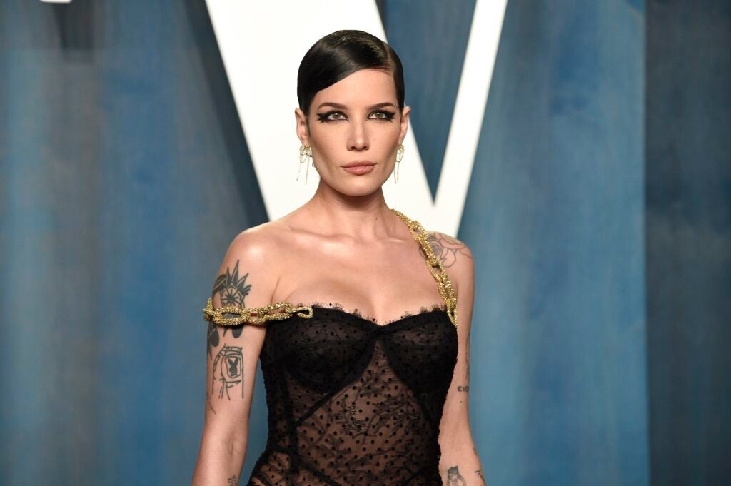 Halsey posing on the red carpet