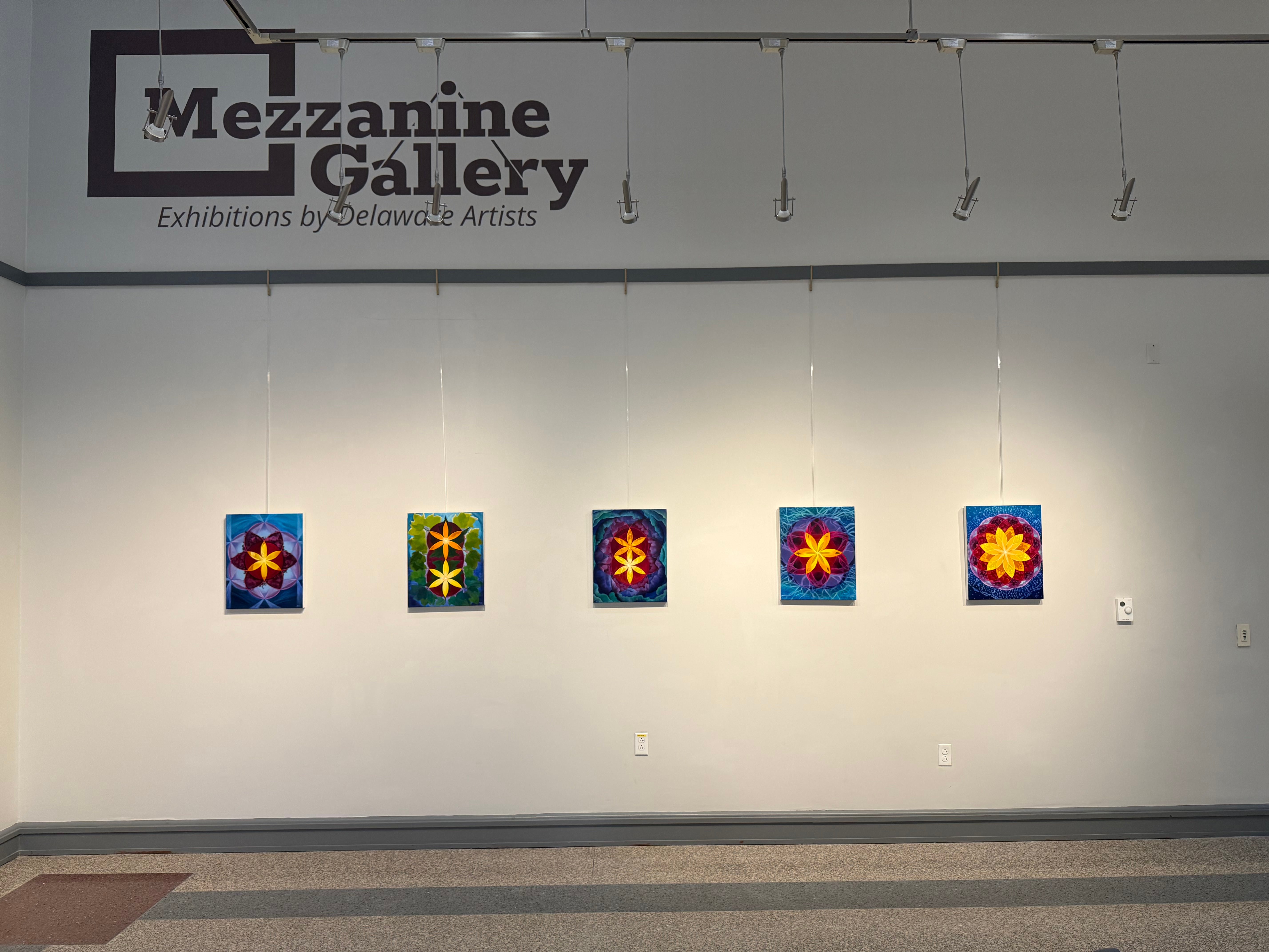 Jen Hintz Eggers paintings on a wall at the Mezzanine Gallery
