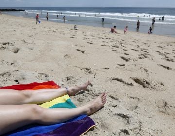 a person tanning on the Jersey Shore