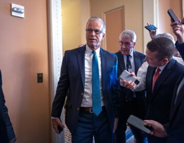 John Thune arrives to a meeting