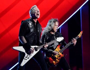 Metallica performing live on stage