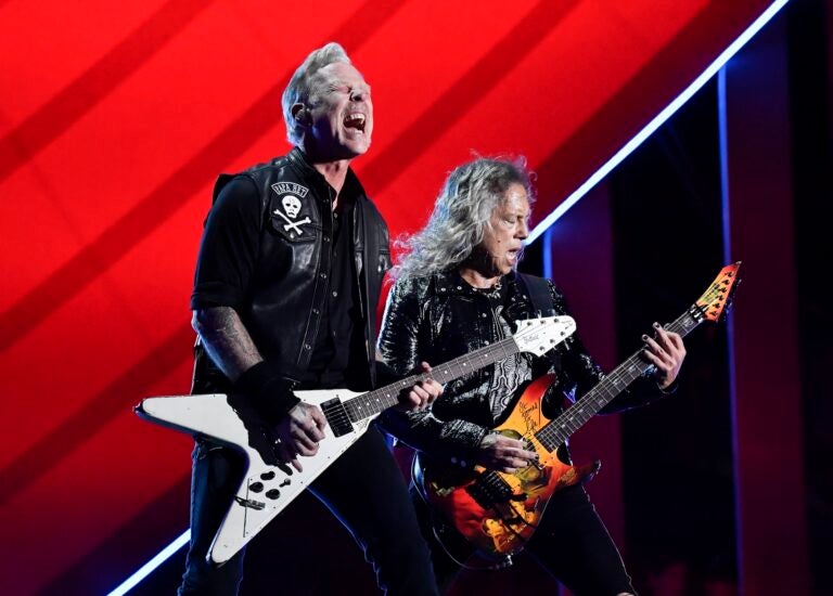 Metallica performing live on stage
