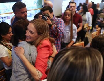 Mikie Sherrill hugs a voter