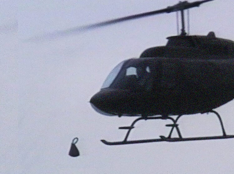 a helicopter drops a bomb