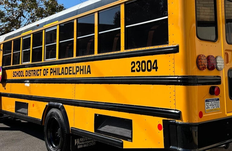File: An electric school bus parked at Lamberton Elementary in West Philadelphia