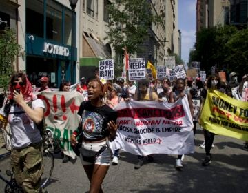 Protesters march through Center City on the way to Rittenhouse Square