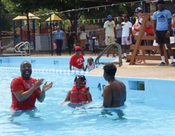 people playing in a swimming pool