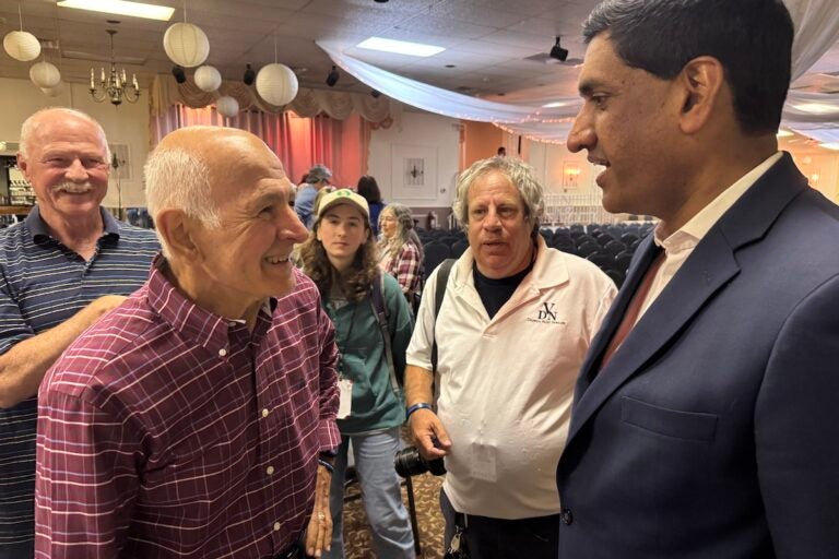 U.S. Rep. Ro Khanna speaking with former teacher