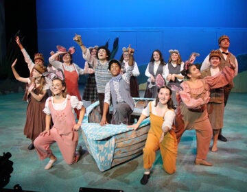 Performers on stage during a play