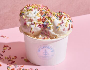 Cup of ice cream with rainbow sprinkles