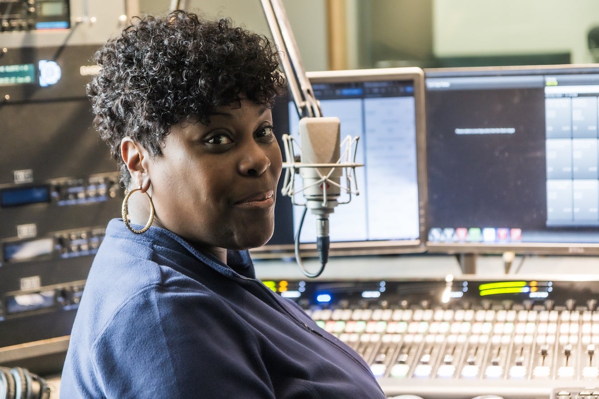 Nicole Sweeney on the mic at the station’s studio